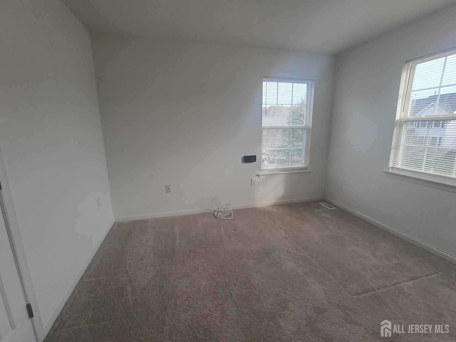 43 Brent Drive Howell, NJ 07731 - Photo 10 of 15 an empty room with windows