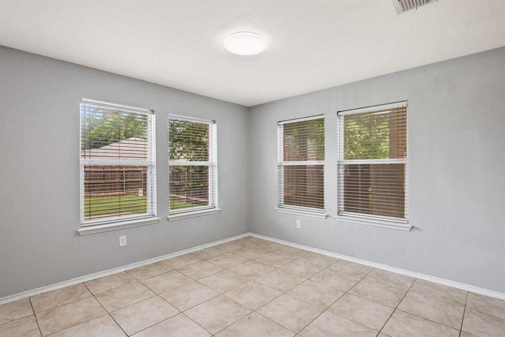 601 Amy Way Euless, TX 76039 - Photo 13 of 40 a view of an empty room with a window