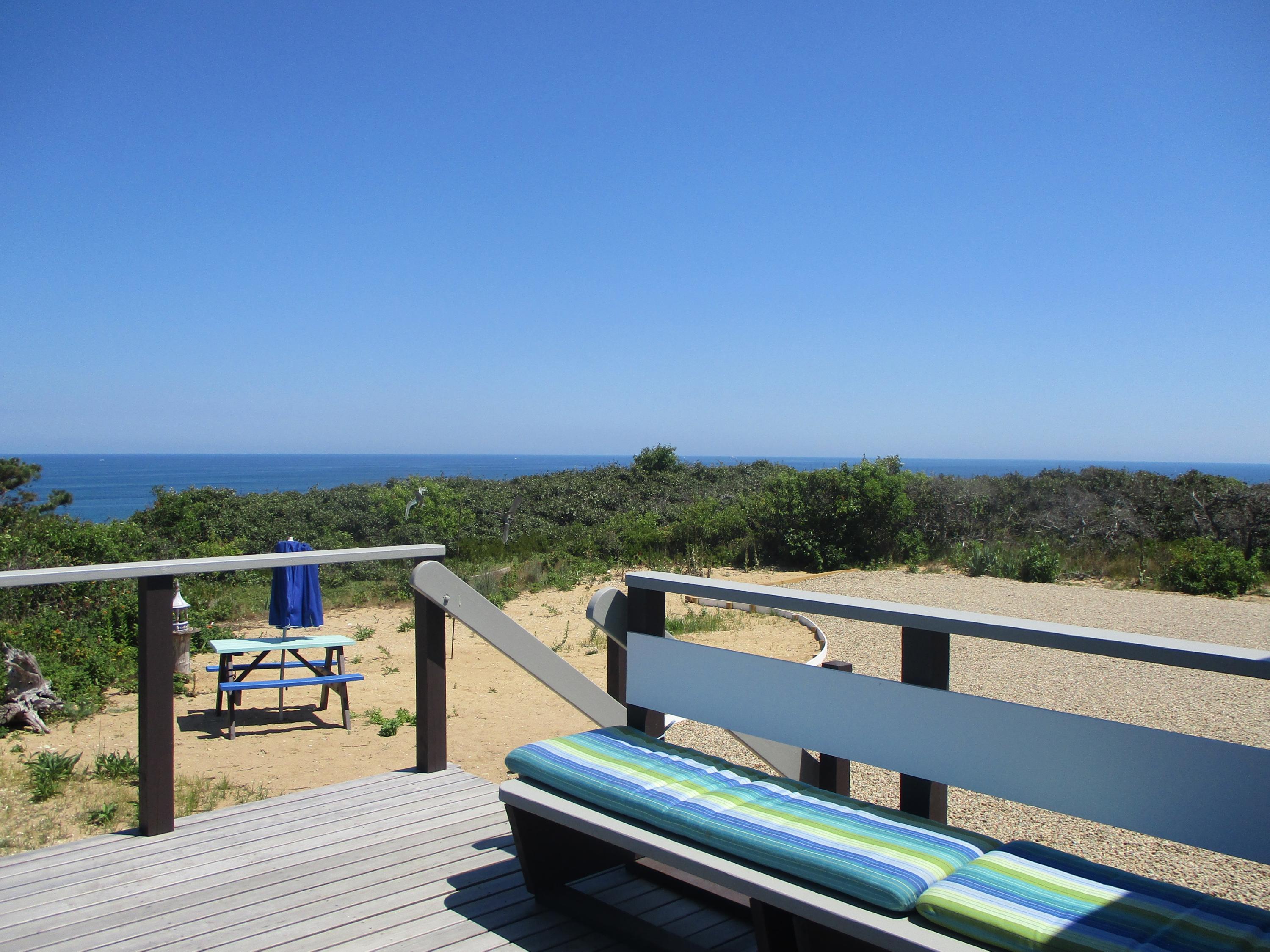 800 Ocean View Drive Wellfleet, MA 02667 - Photo 12 of 38 a view of a balcony with chairs