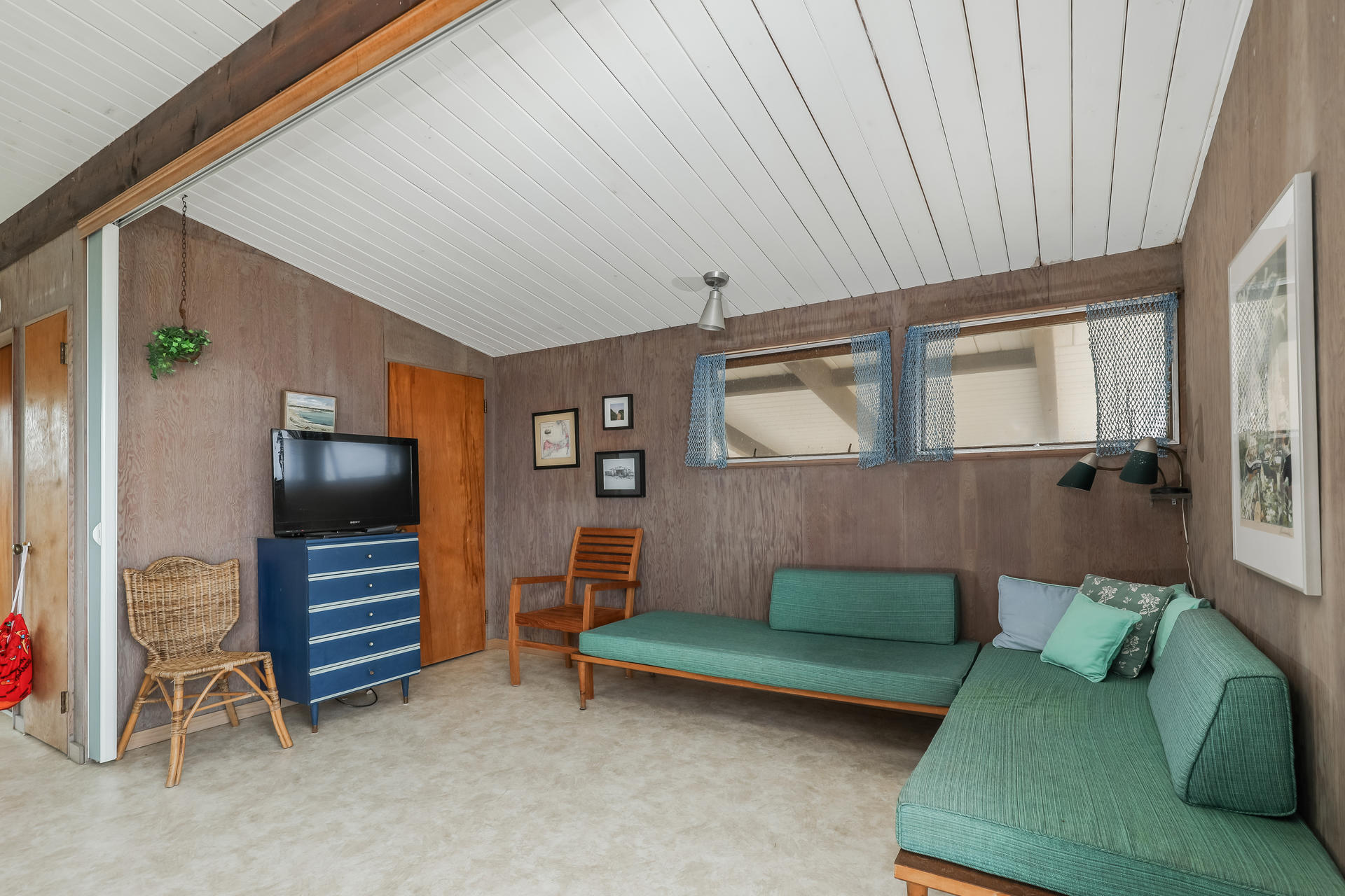 800 Ocean View Drive Wellfleet, MA 02667 - Photo 16 of 38 a living room with furniture and a flat screen tv