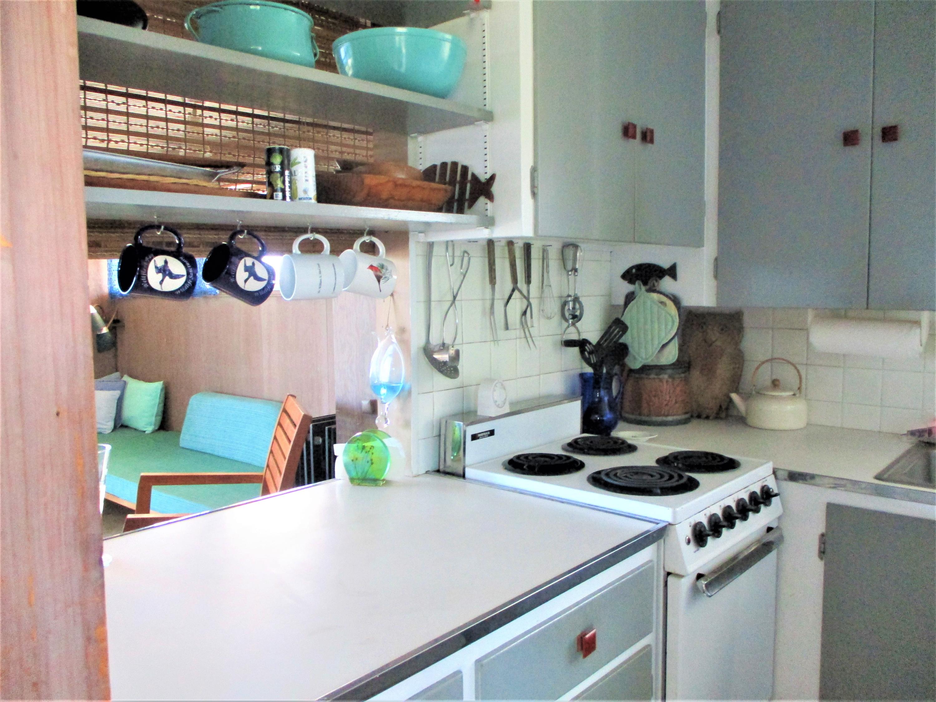 800 Ocean View Drive Wellfleet, MA 02667 - Photo 21 of 38 a kitchen with a stove and a refrigerator