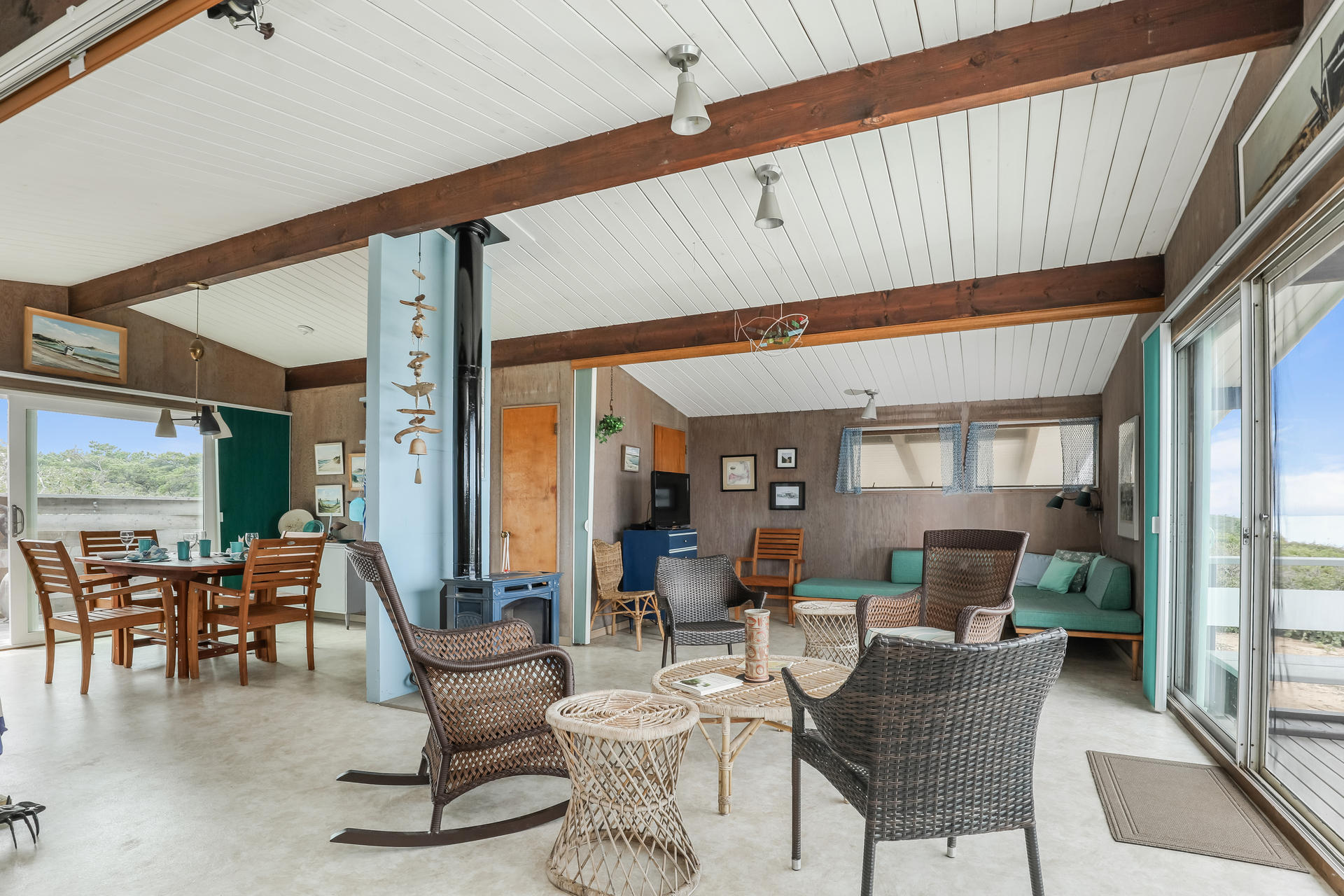 800 Ocean View Drive Wellfleet, MA 02667 - Photo 24 of 38 a dining room with furniture a table and chairs