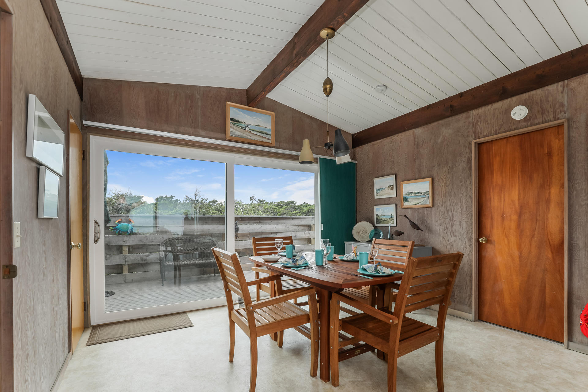 800 Ocean View Drive Wellfleet, MA 02667 - Photo 25 of 38 a view of a dining room with tables and chairs