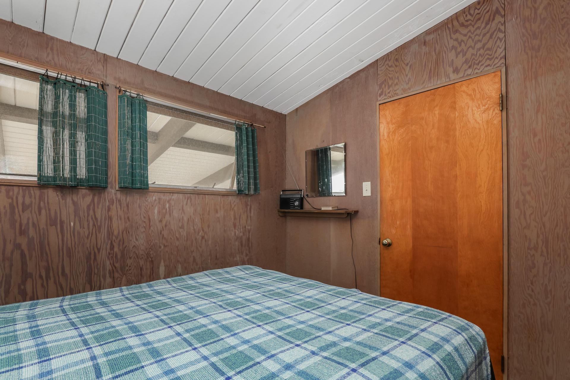 800 Ocean View Drive Wellfleet, MA 02667 - Photo 27 of 38 a bedroom with a bed and a window