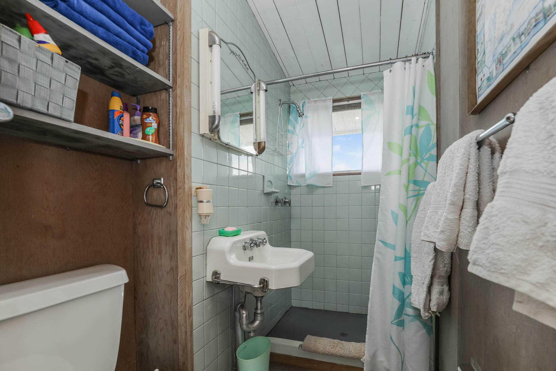 800 Ocean View Drive Wellfleet, MA 02667 - Photo 28 of 38 a bathroom with a sink toilet and a shower