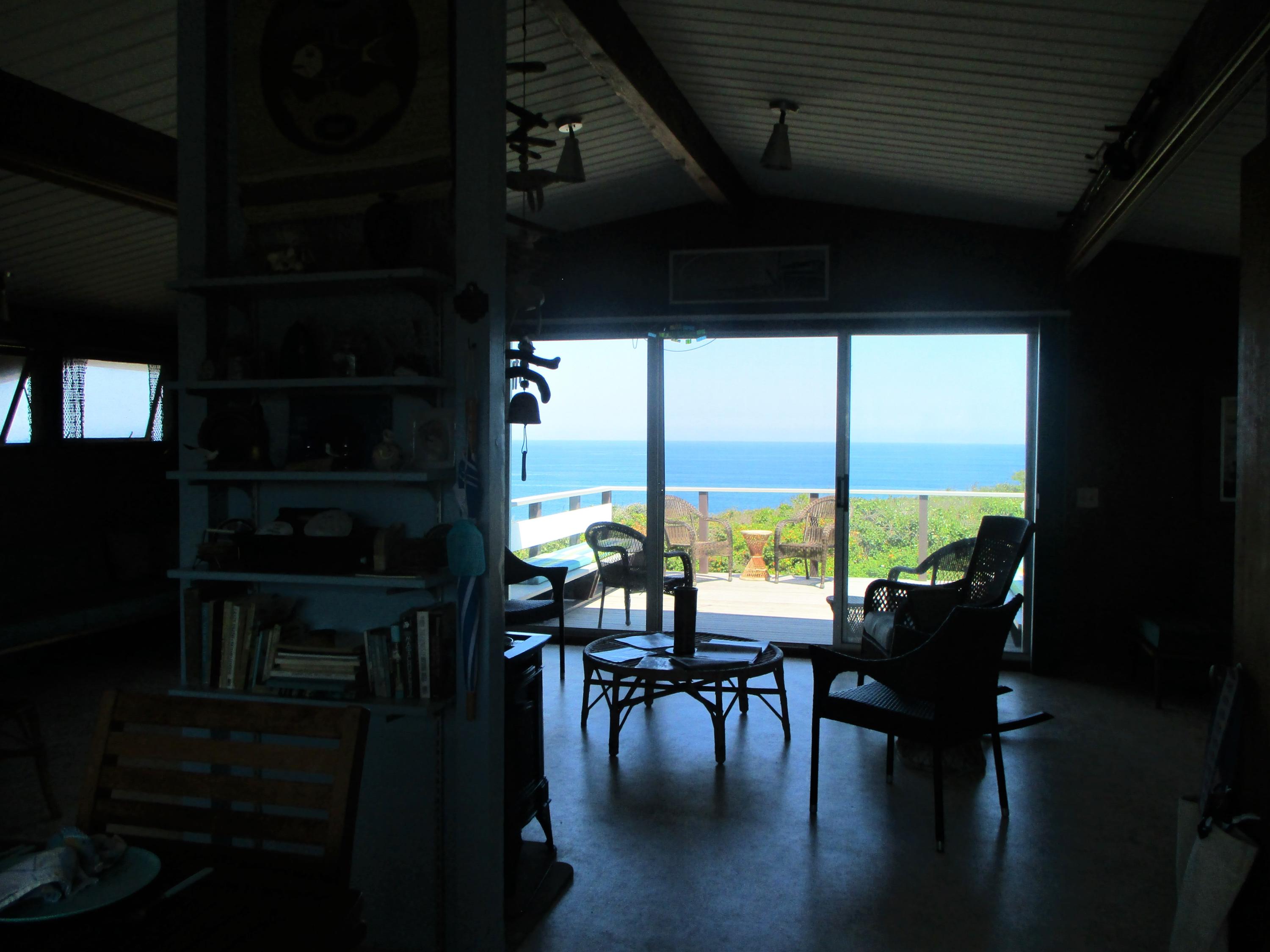 800 Ocean View Drive Wellfleet, MA 02667 - Photo 9 of 38 a living room with furniture and floor to ceiling window
