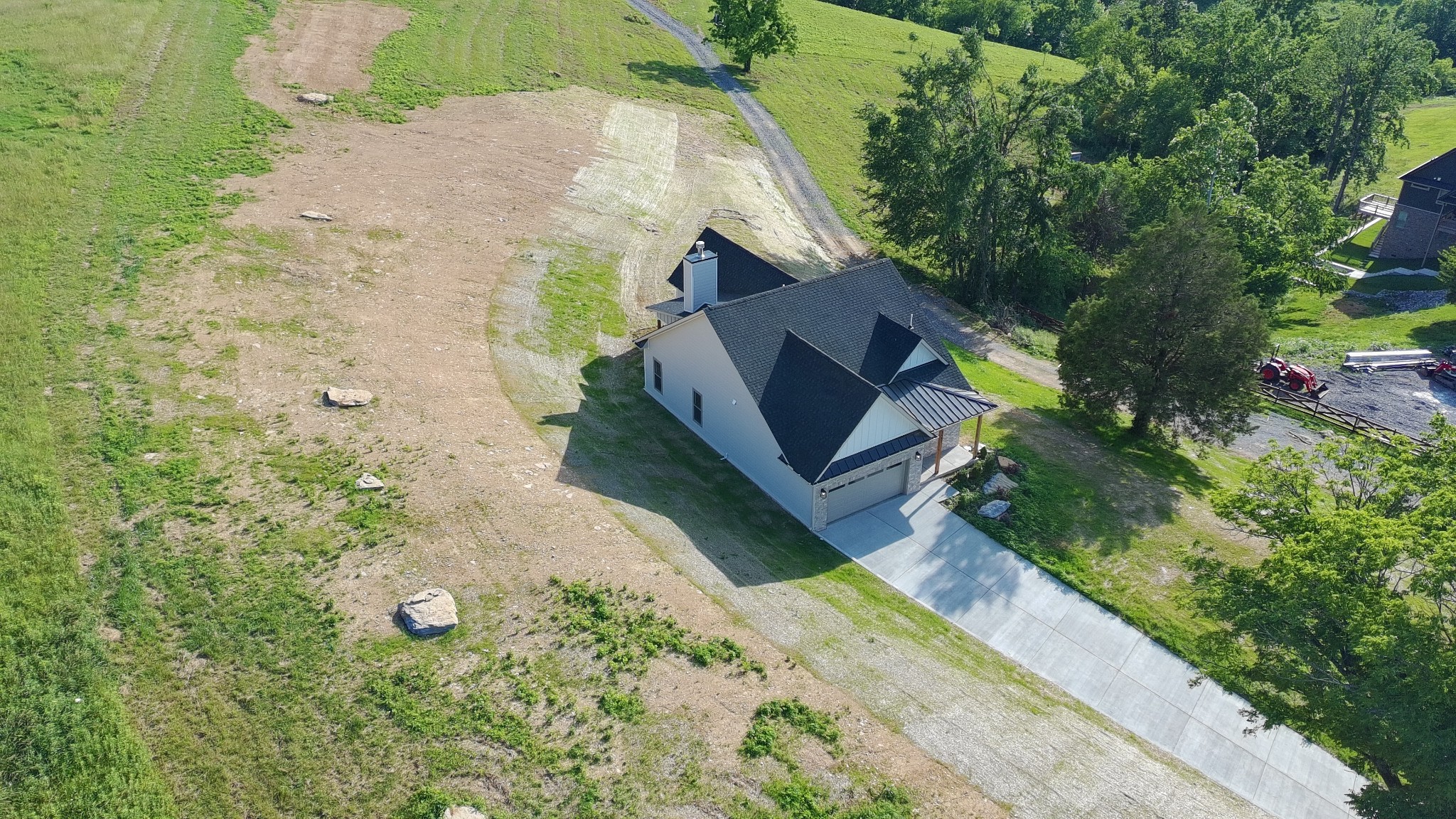 2953 Wixtown Road Westmoreland, TN 37186 - Photo 5 of 35 an aerial view of a house with a yard