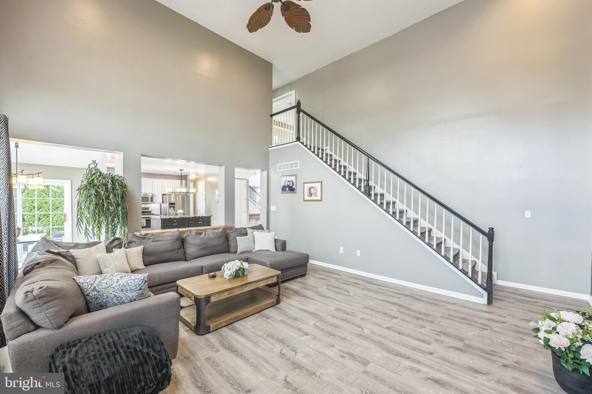 104 Abigail Lane Mickleton, NJ 08056 - Photo 16 of 75 a living room with furniture and wooden floor