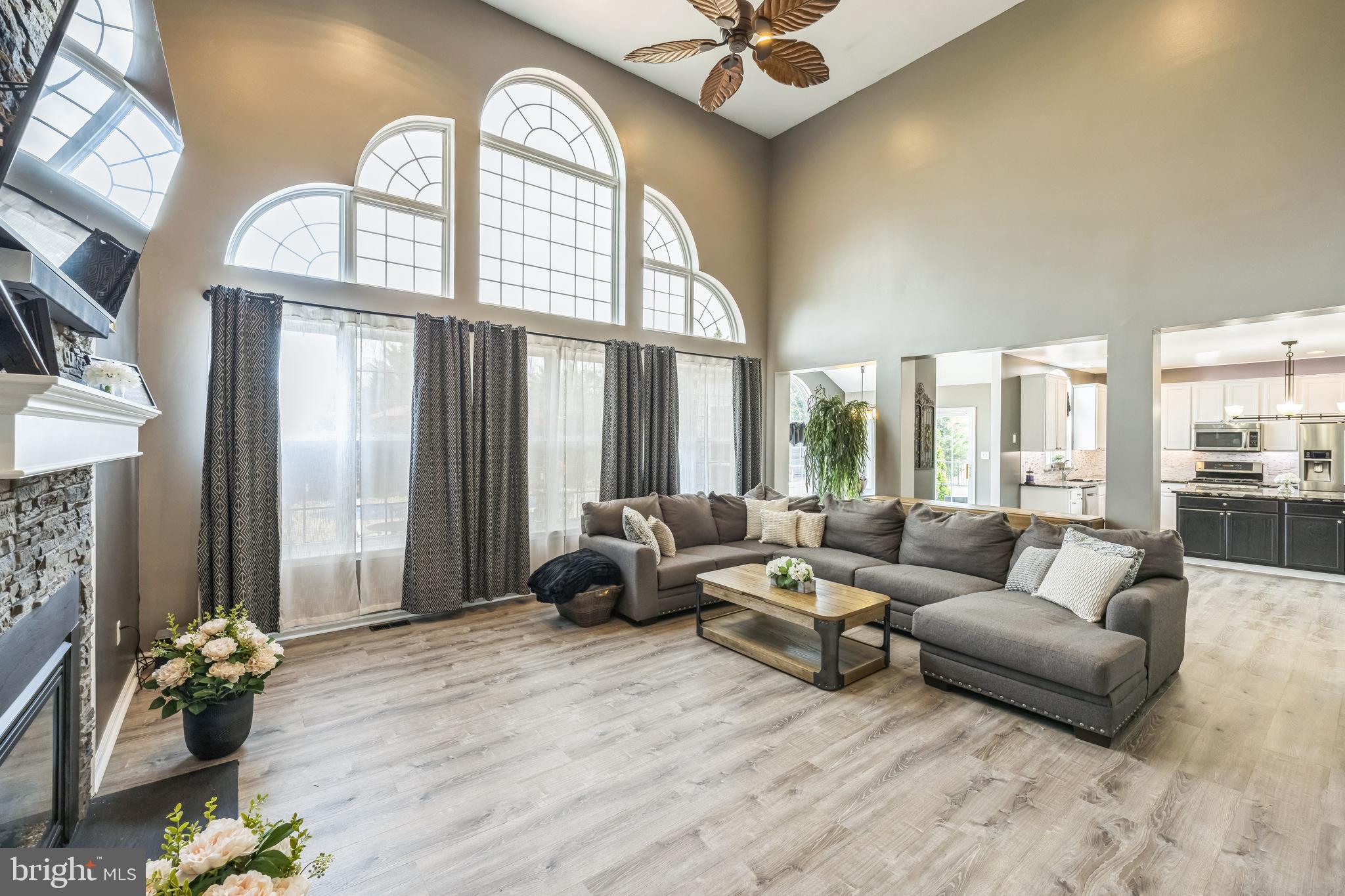 104 Abigail Lane Mickleton, NJ 08056 - Photo 18 of 75 a living room with furniture fireplace and a large window