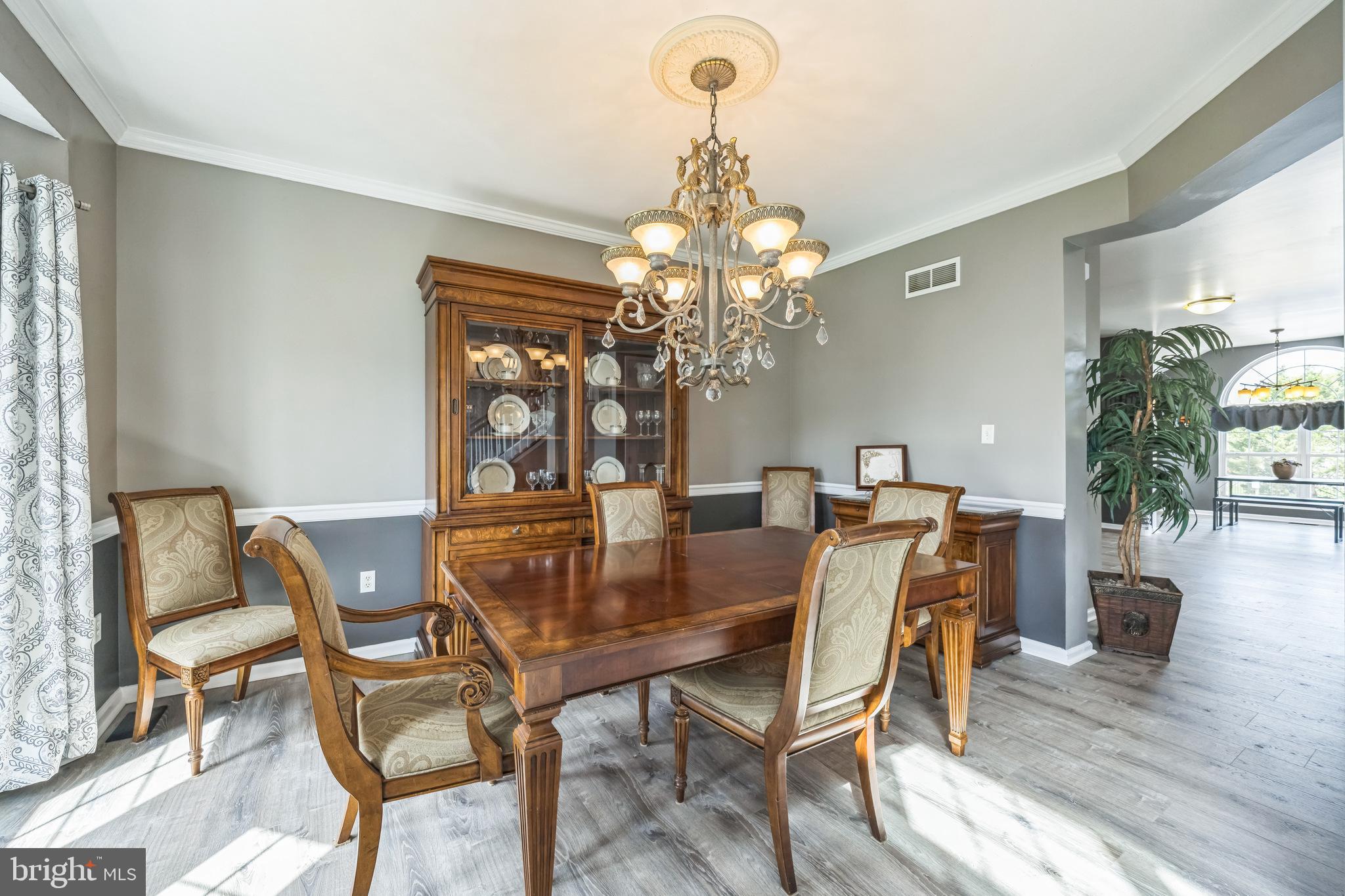 104 Abigail Lane Mickleton, NJ 08056 - Photo 20 of 75 a view of a dining room with furniture and wooden floor