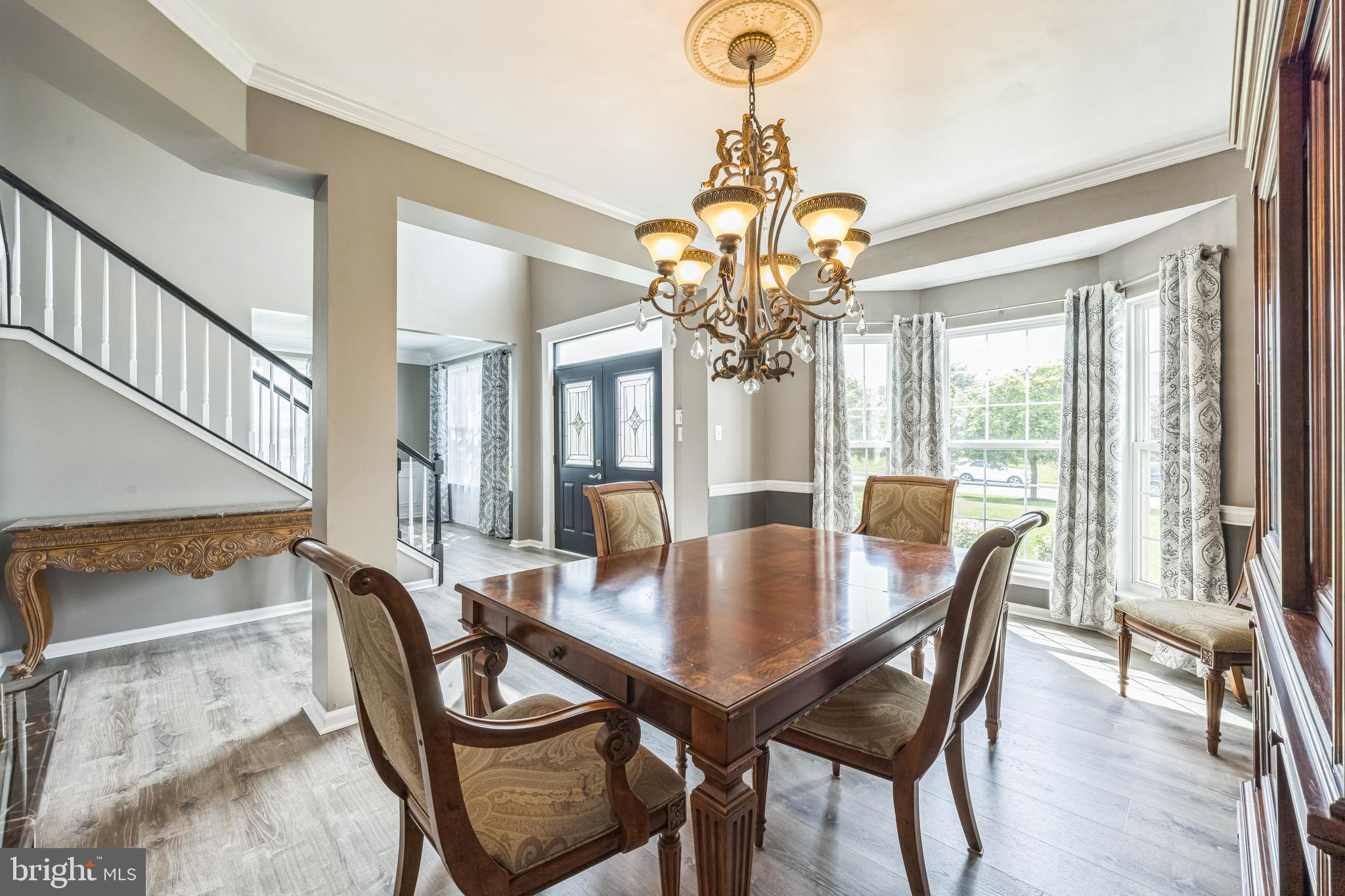 104 Abigail Lane Mickleton, NJ 08056 - Photo 21 of 75 a view of a dining room with furniture window and wooden floor