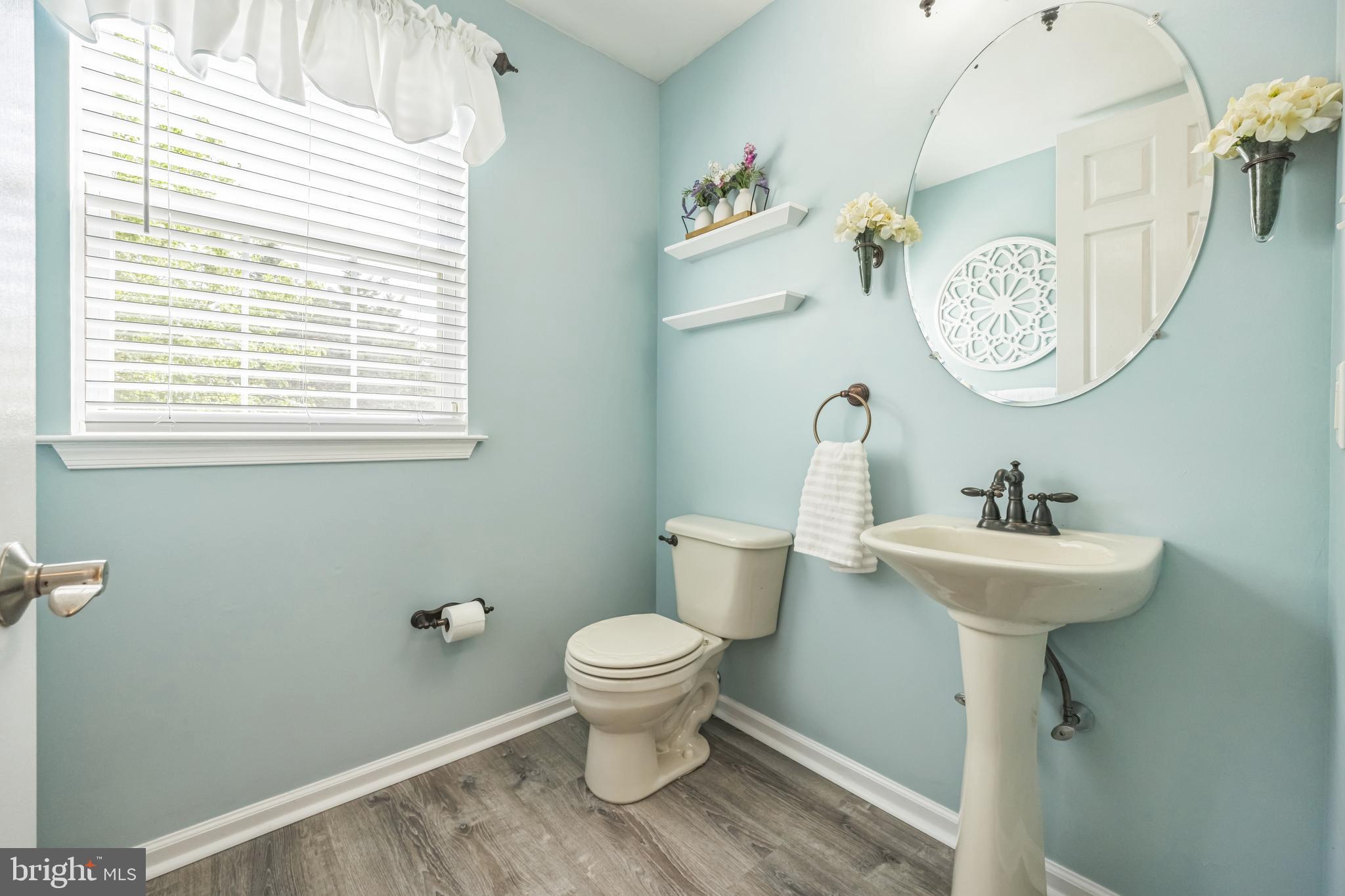 104 Abigail Lane Mickleton, NJ 08056 - Photo 31 of 75 a bathroom with a sink a toilet and a window