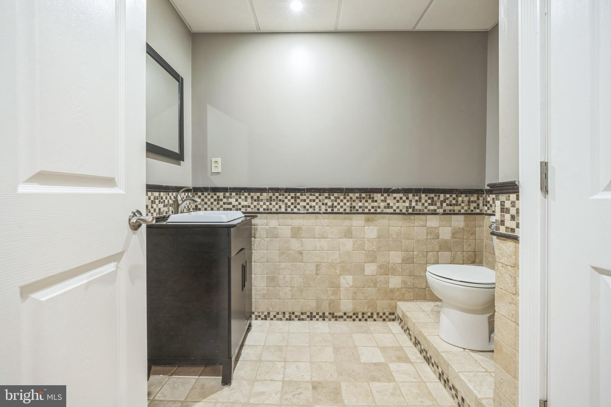 104 Abigail Lane Mickleton, NJ 08056 - Photo 38 of 75 a bathroom with a toilet and a sink