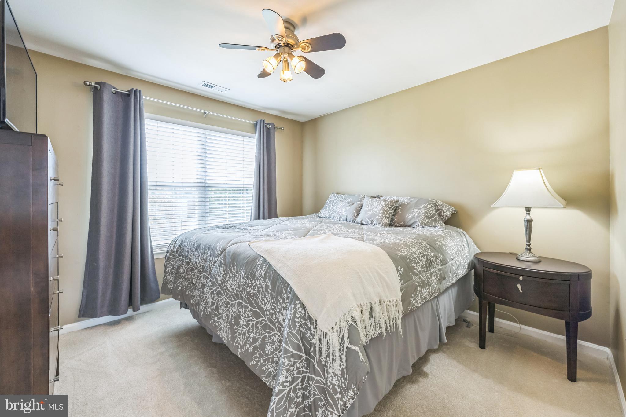 104 Abigail Lane Mickleton, NJ 08056 - Photo 41 of 75 a bedroom with a bed and a window