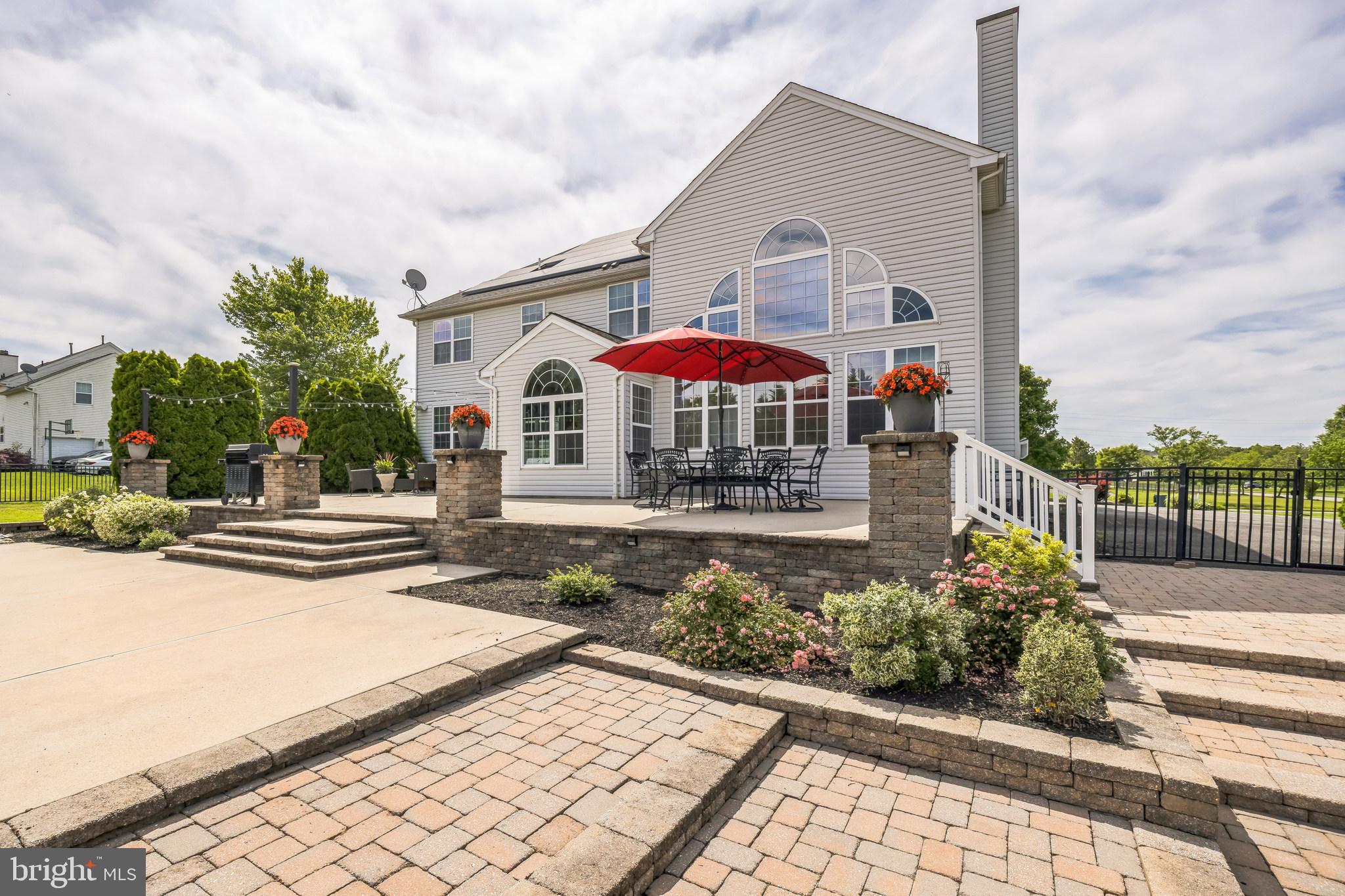 104 Abigail Lane Mickleton, NJ 08056 - Photo 46 of 75 ground view of patio and back of home