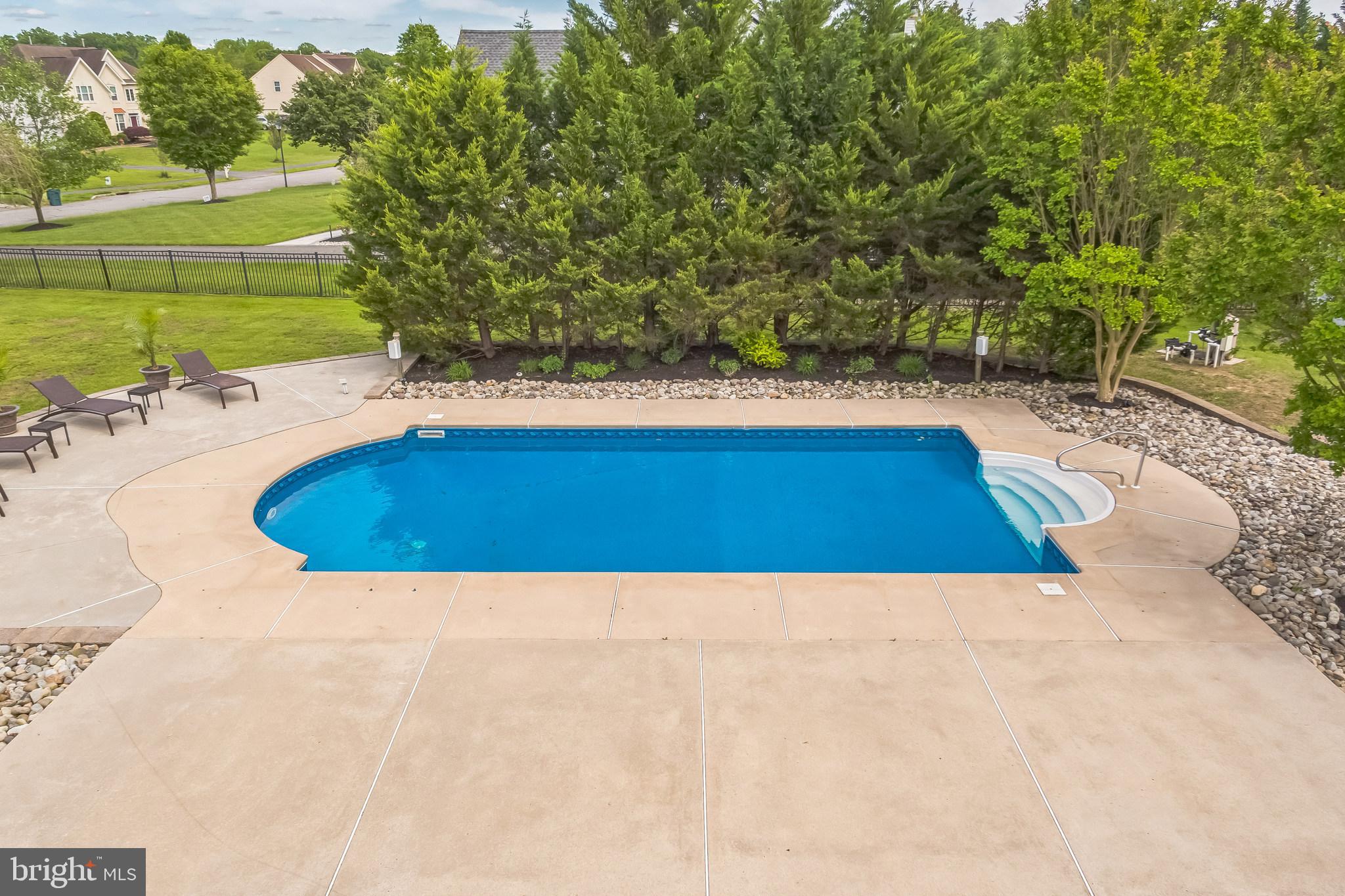 104 Abigail Lane Mickleton, NJ 08056 - Photo 49 of 75 a view of swimming pool with a yard