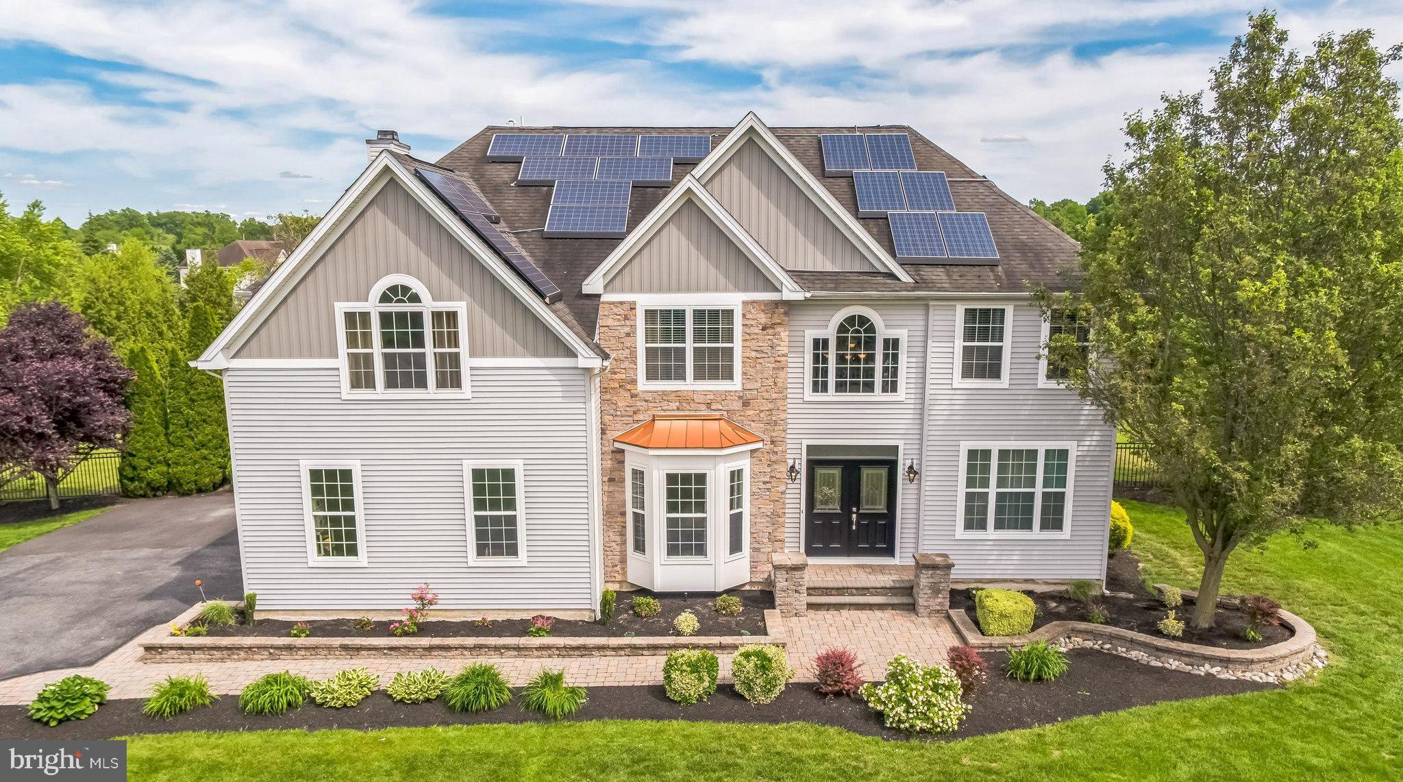 104 Abigail Lane Mickleton, NJ 08056 - Photo 5 of 75 a front view of a house with a yard