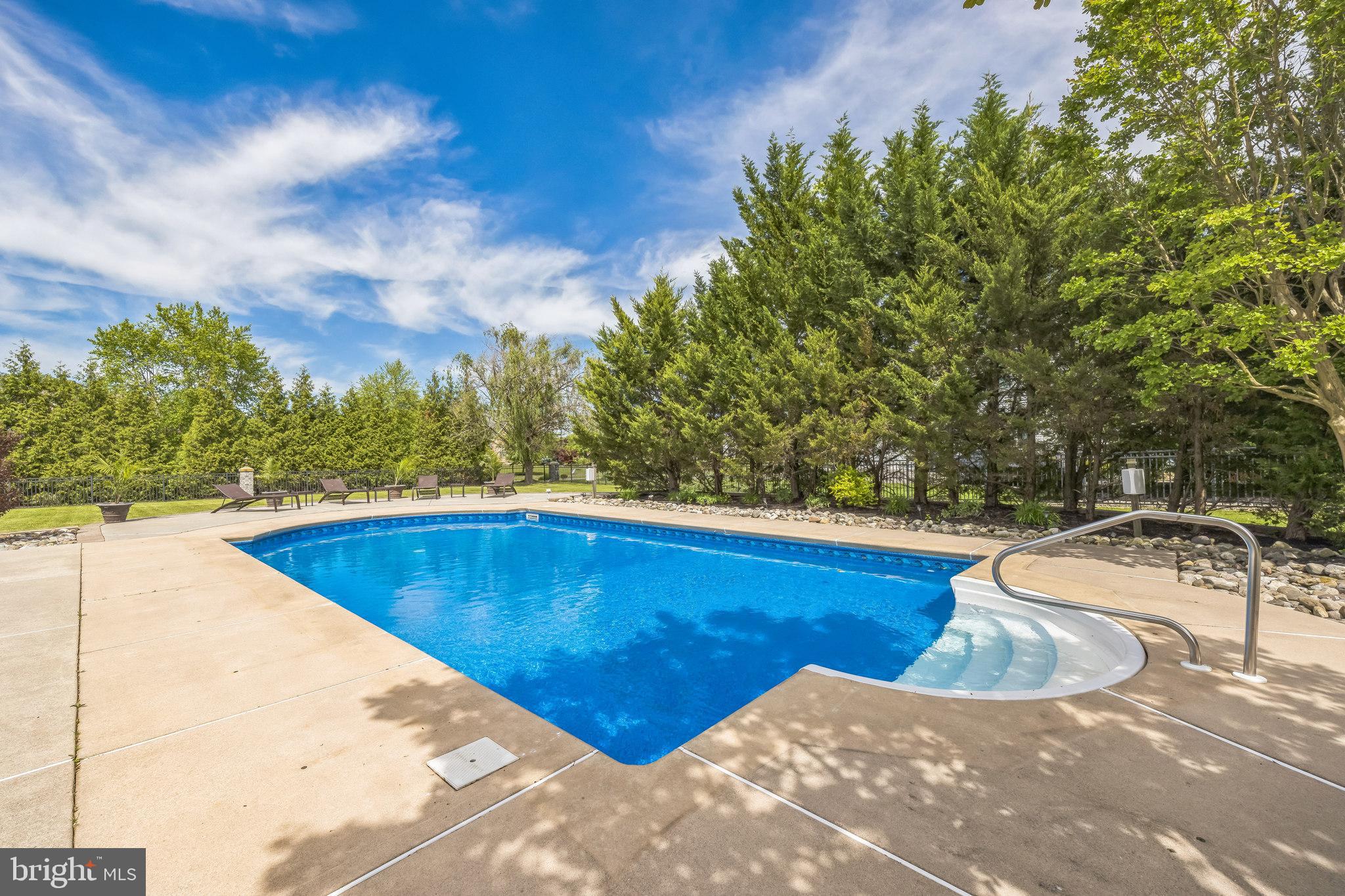 104 Abigail Lane Mickleton, NJ 08056 - Photo 52 of 75 a view of a swimming pool with an outdoor seating