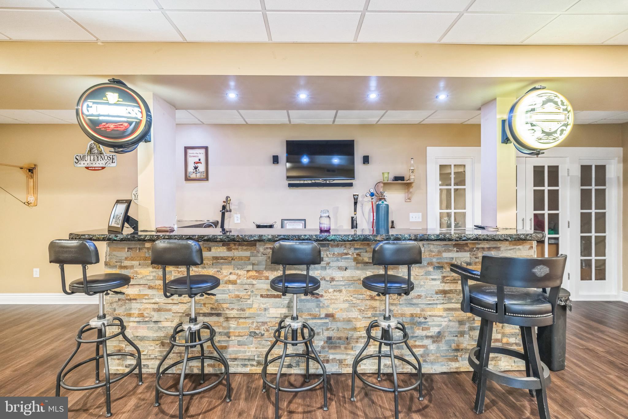 104 Abigail Lane Mickleton, NJ 08056 - Photo 57 of 75 a view of a dining room with furniture and a wall painting