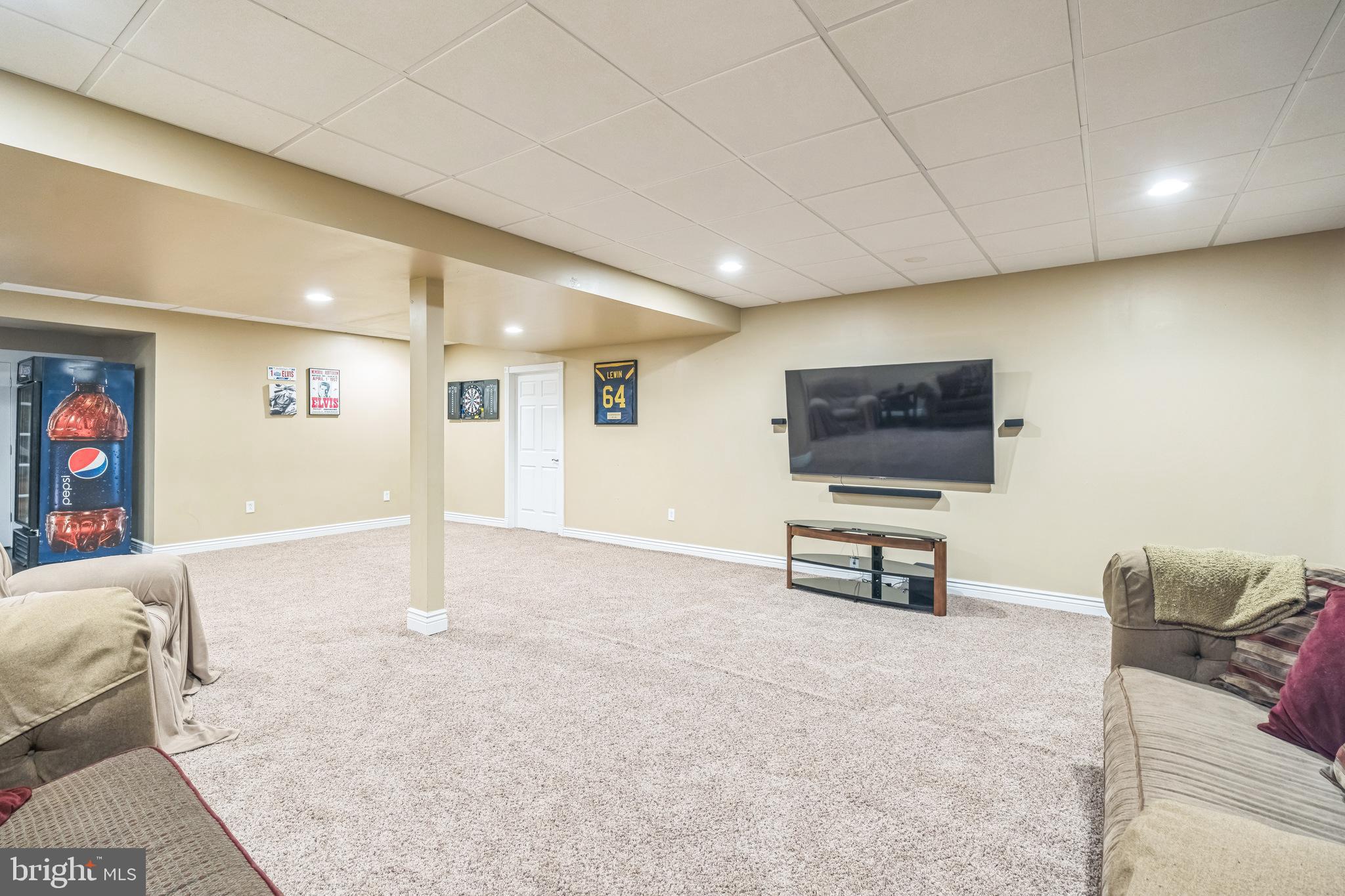 104 Abigail Lane Mickleton, NJ 08056 - Photo 60 of 75 a living room with furniture and a flat screen tv