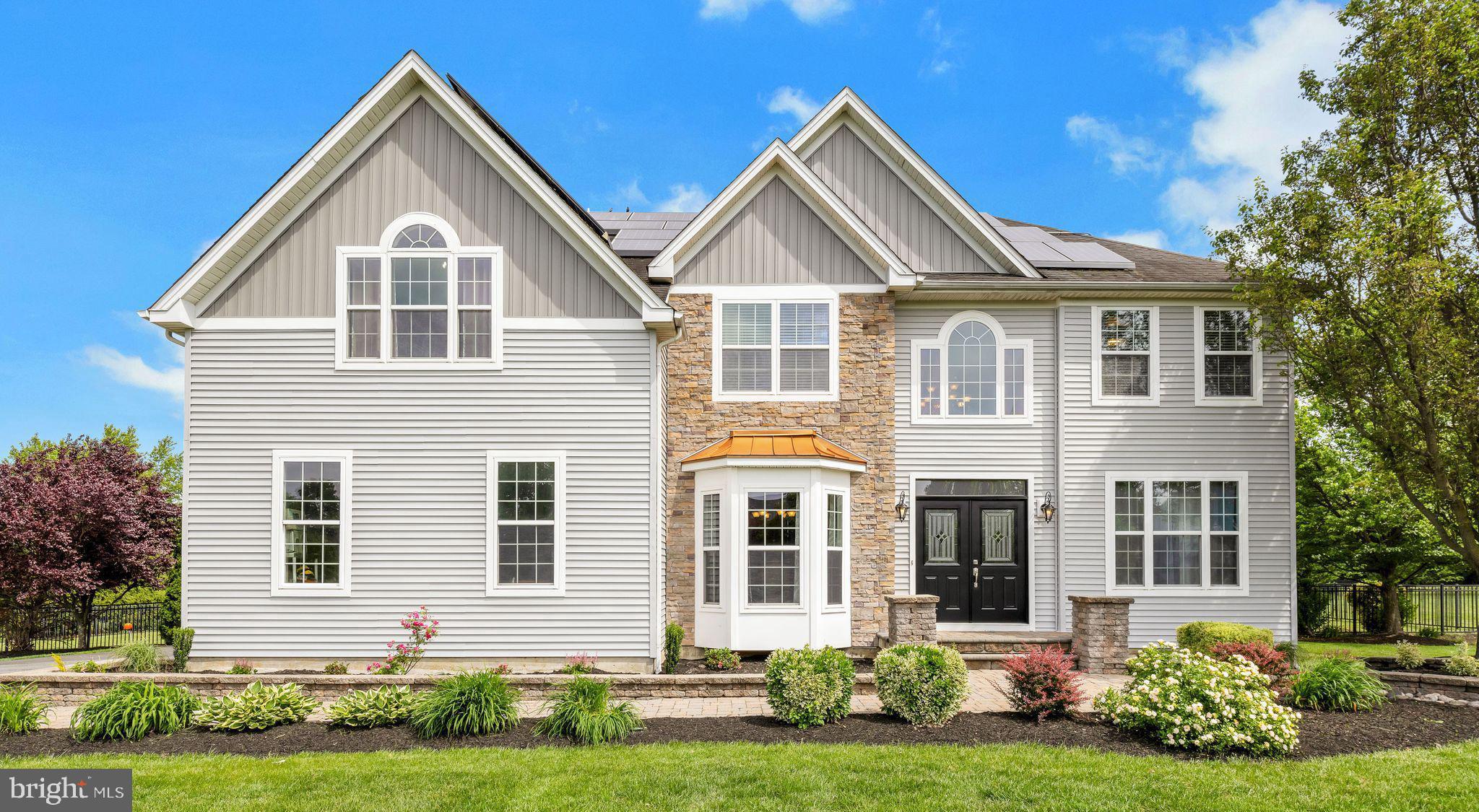 104 Abigail Lane Mickleton, NJ 08056 - Photo 6 of 75 a front view of a house