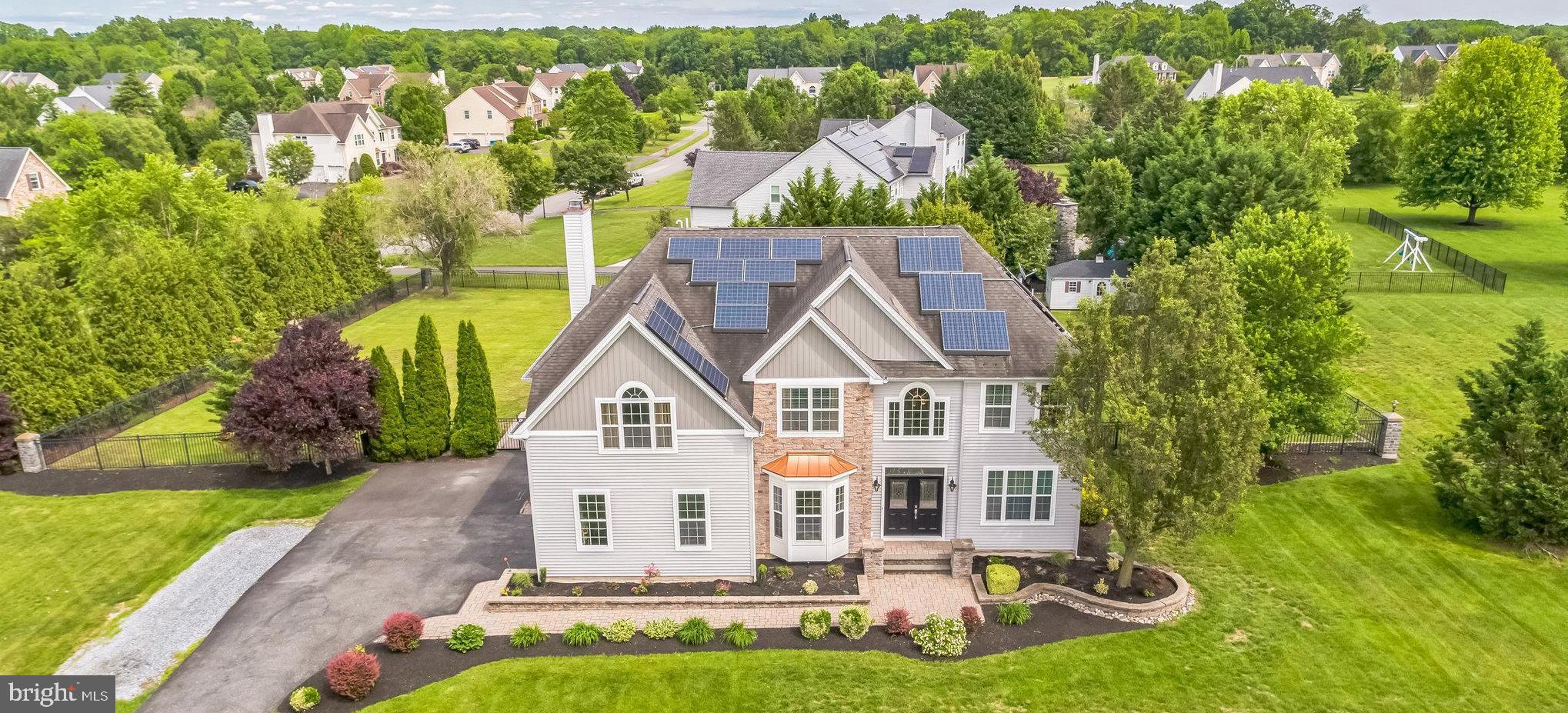 104 Abigail Lane Mickleton, NJ 08056 - Photo 7 of 75 a aerial view of a house with a yard table and chairs