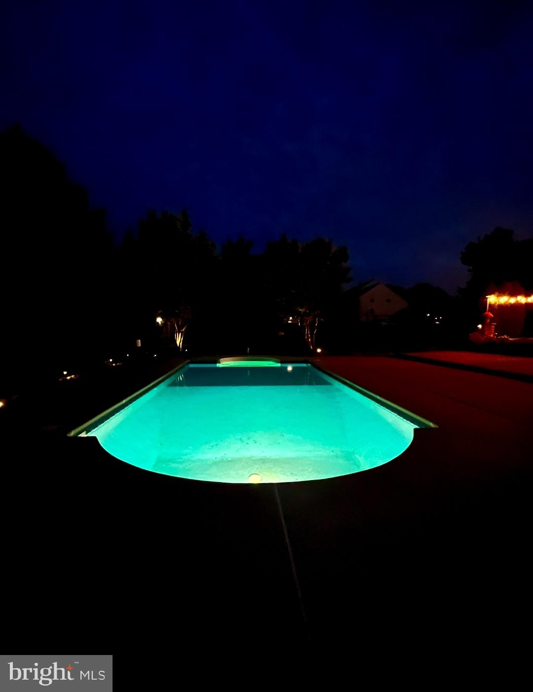 104 Abigail Lane Mickleton, NJ 08056 - Photo 75 of 75 a view of a swimming pool with an outdoor seating and kitchen
