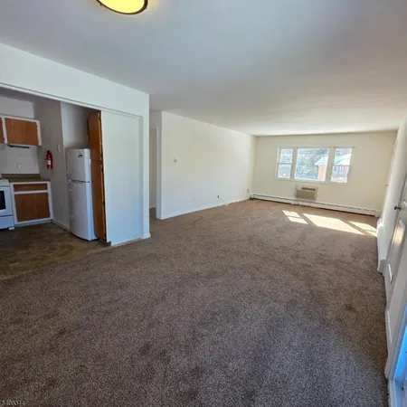 a view of a livingroom with a fireplace