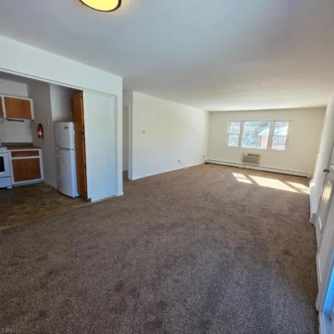 a view of a livingroom with a fireplace