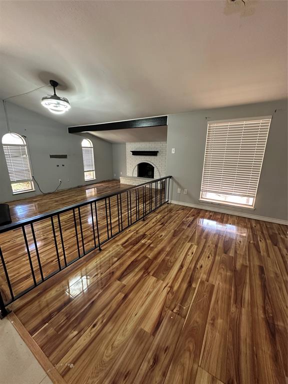 a view of entryway with wooden floor
