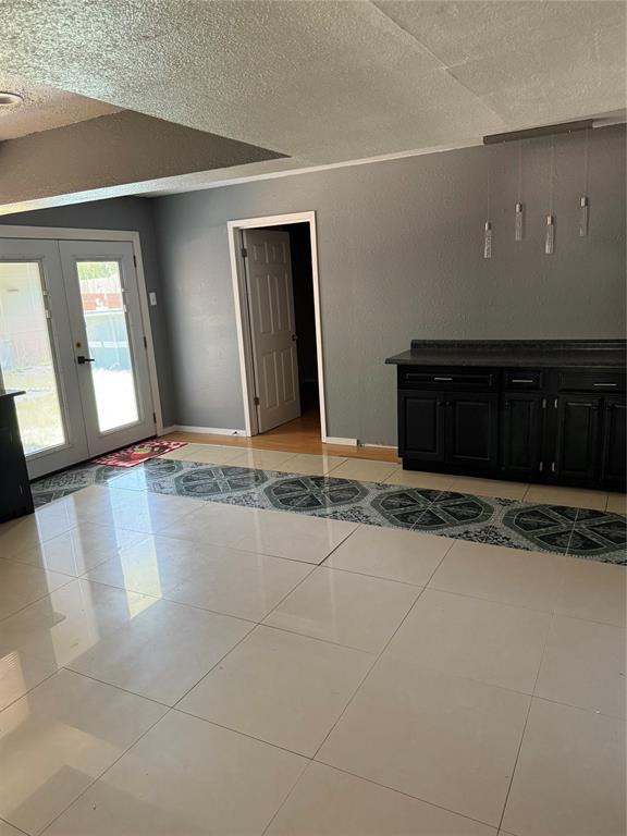 4601 Elm Ridge Lane Garland, TX 75044 - Photo 16 of 20 a view of a livingroom with a fireplace and a window