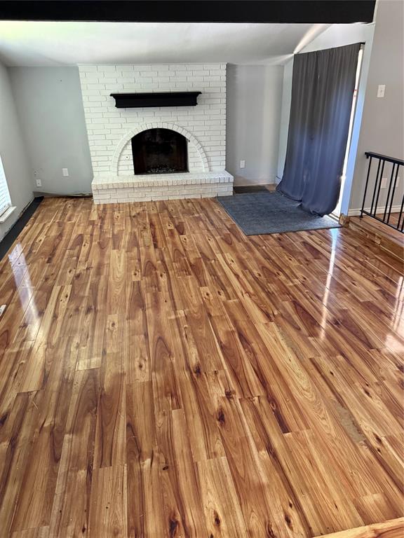 4601 Elm Ridge Lane Garland, TX 75044 - Photo 19 of 20 a view of wooden floor in a room