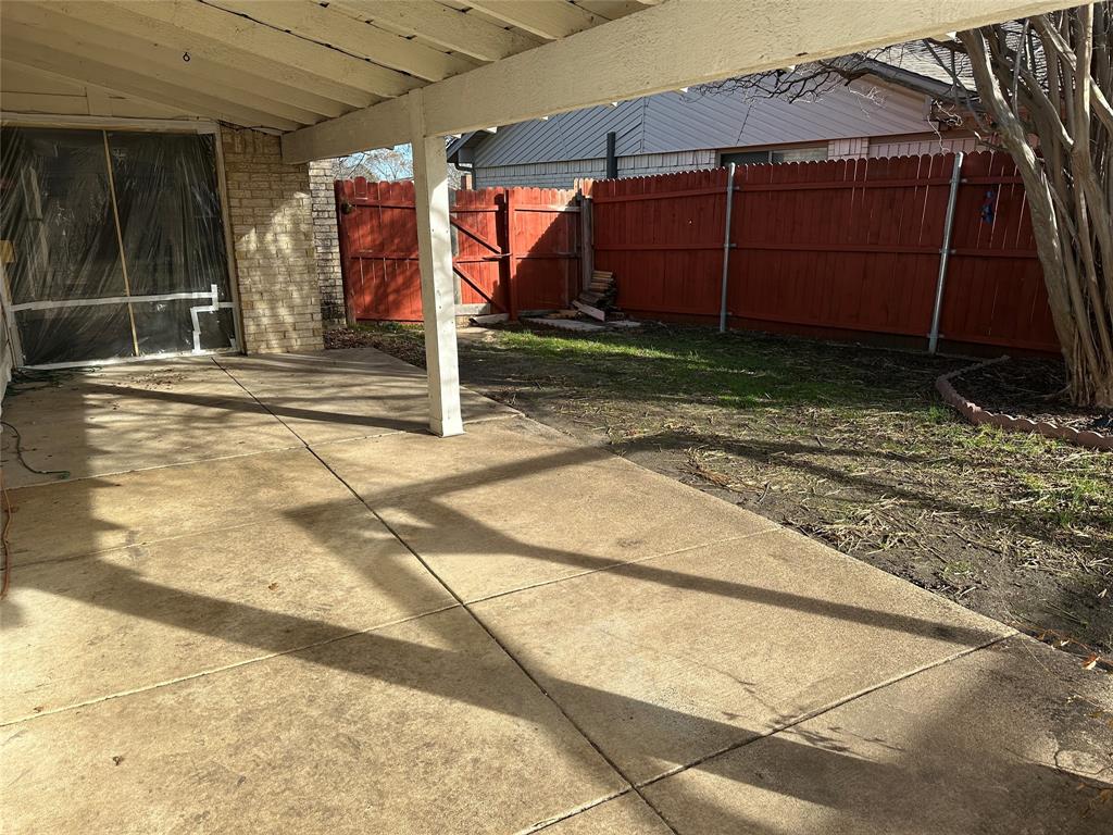 4601 Elm Ridge Lane Garland, TX 75044 - Photo 10 of 20 a view of a backyard