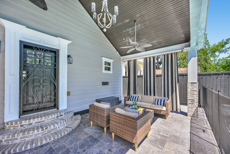 1122 East 23rd Street Houston, TX 77009 - Photo 16 of 23 Covered outdoor living area designed for year-round enjoyment and effortless entertaining.
