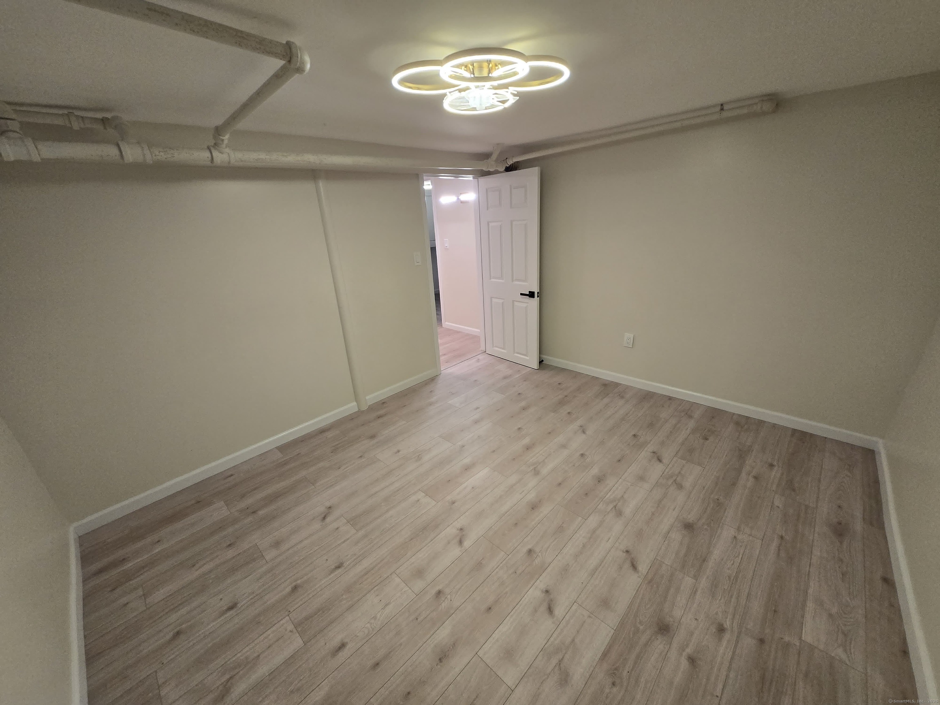 33 Bank Street Hamden, CT 06514 - Photo 26 of 32 a view of an empty room with a window