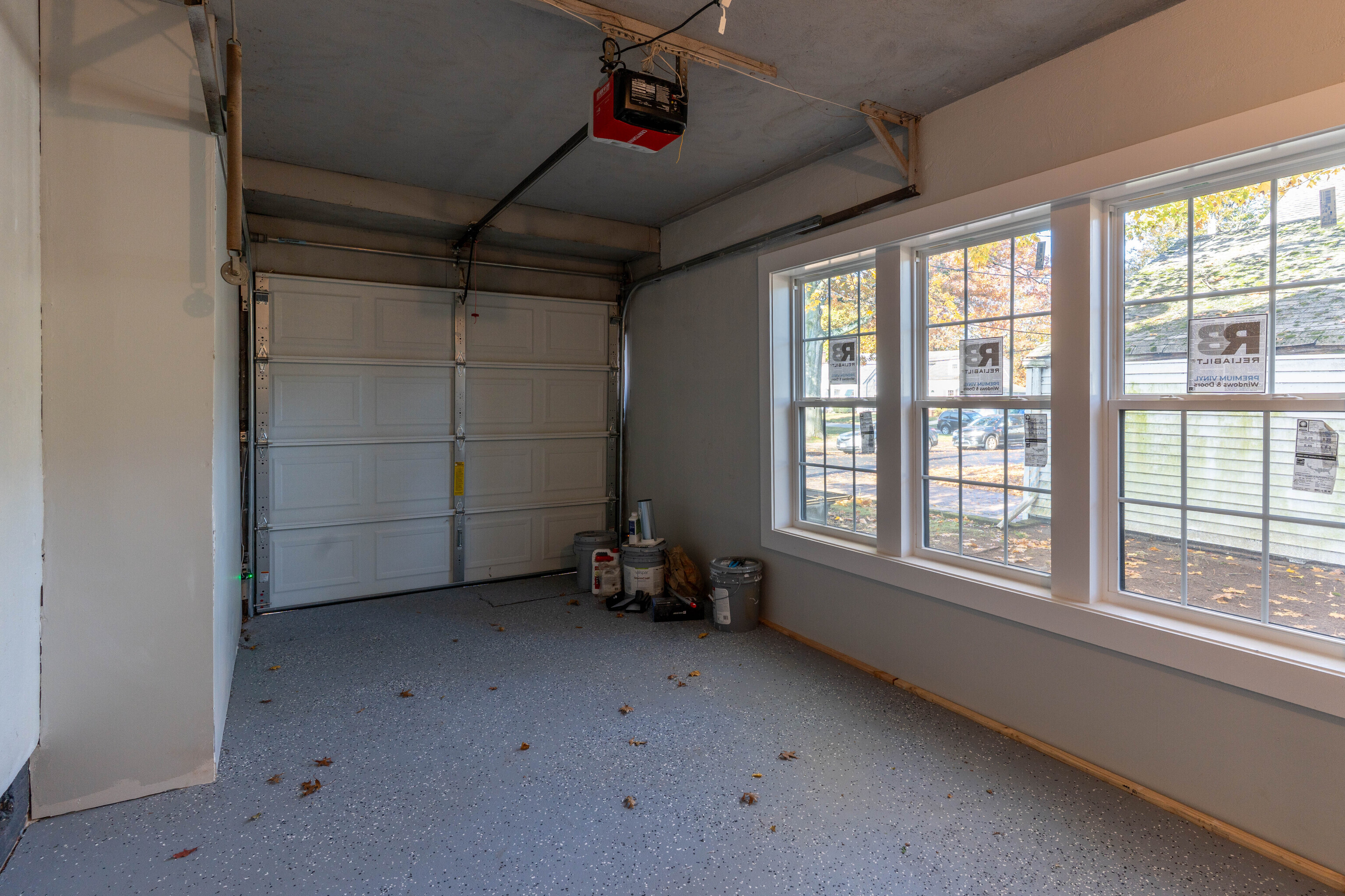 33 Bank Street Hamden, CT 06514 - Photo 28 of 32 an empty room with a chair and a window