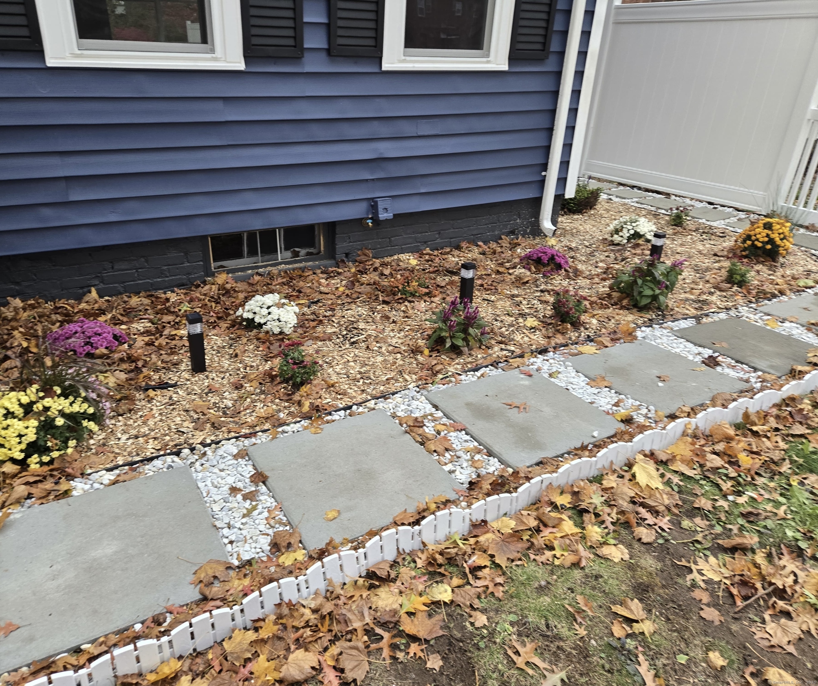 33 Bank Street Hamden, CT 06514 - Photo 30 of 32 a view of a backyard with a garden