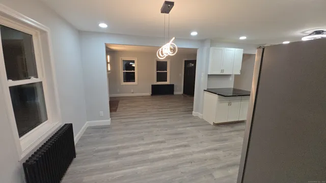 a view of a kitchen from a living room