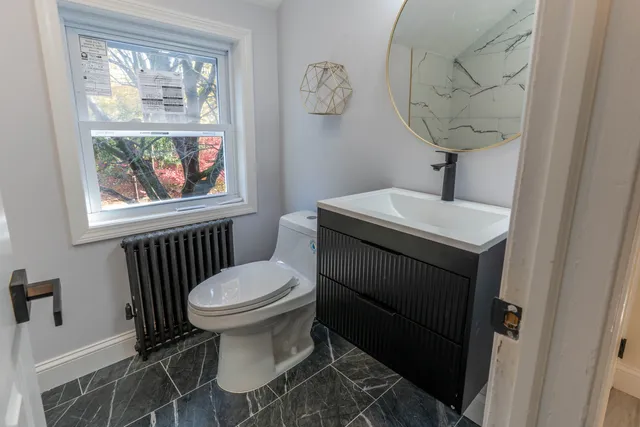 a bathroom with a sink and a toilet