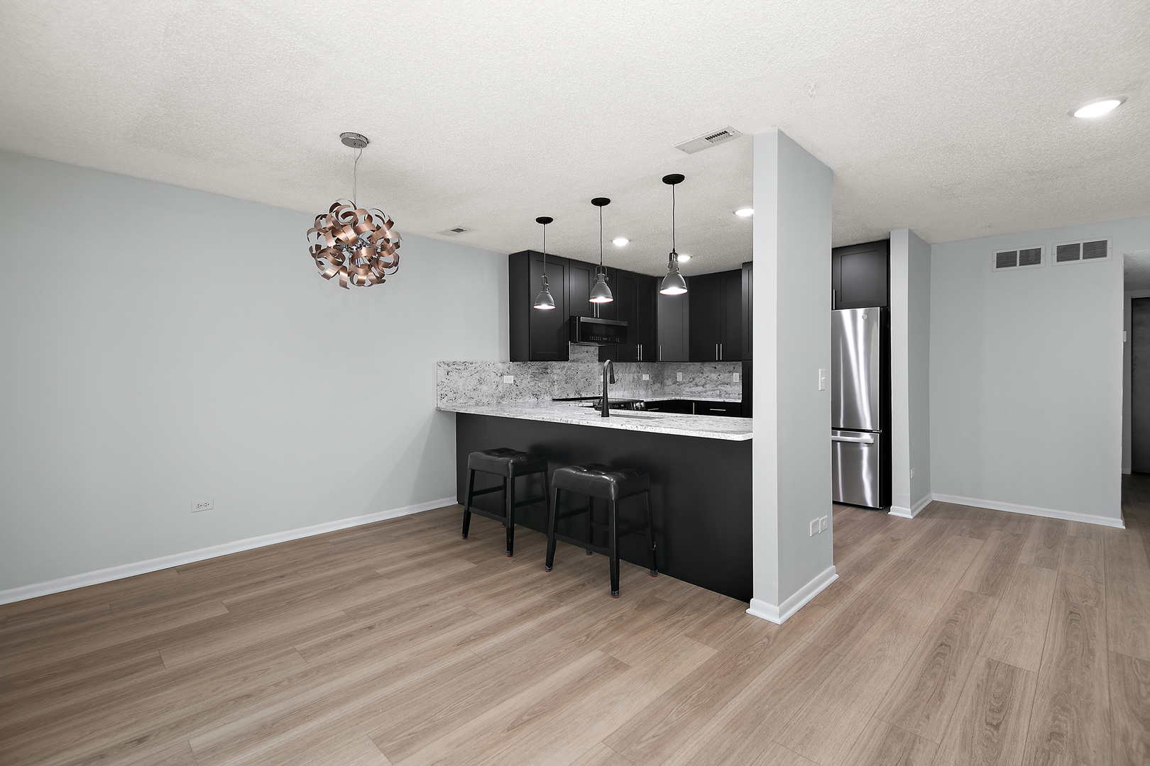15717 Orlan Brook Drive, Unit 84 Orland Park, IL 60462 - Photo 7 of 18 a view of kitchen with sink and refrigerator