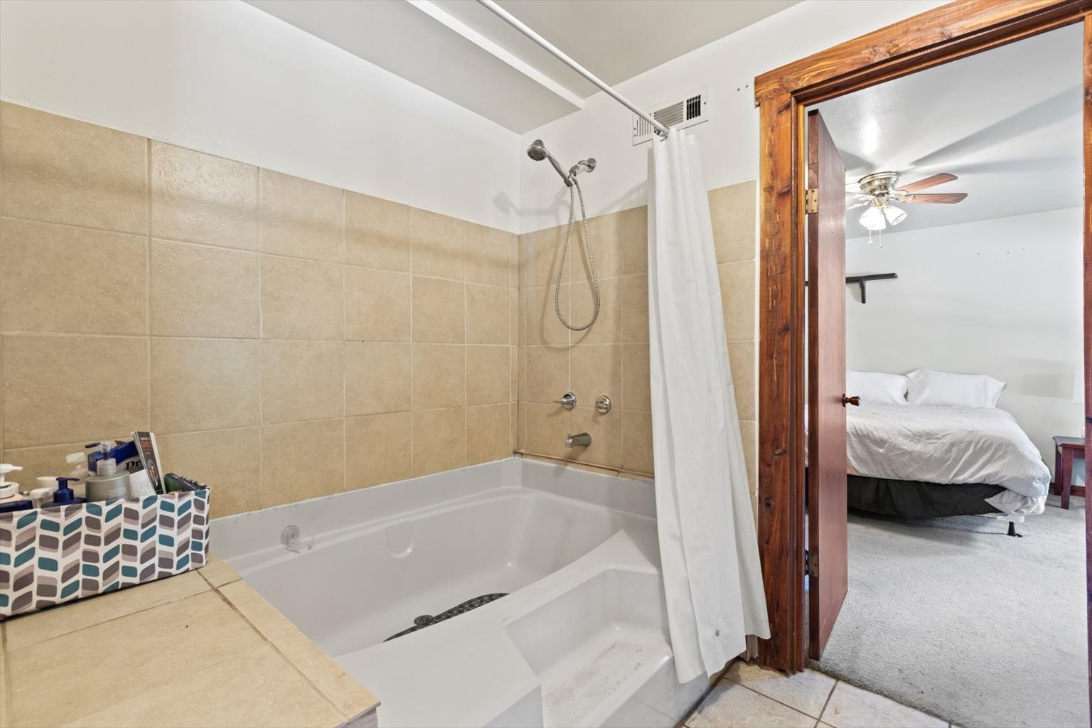 3911 Mobley's Cut Road Columbia, TN 38401 - Photo 16 of 19 a bathroom with a tub and shower