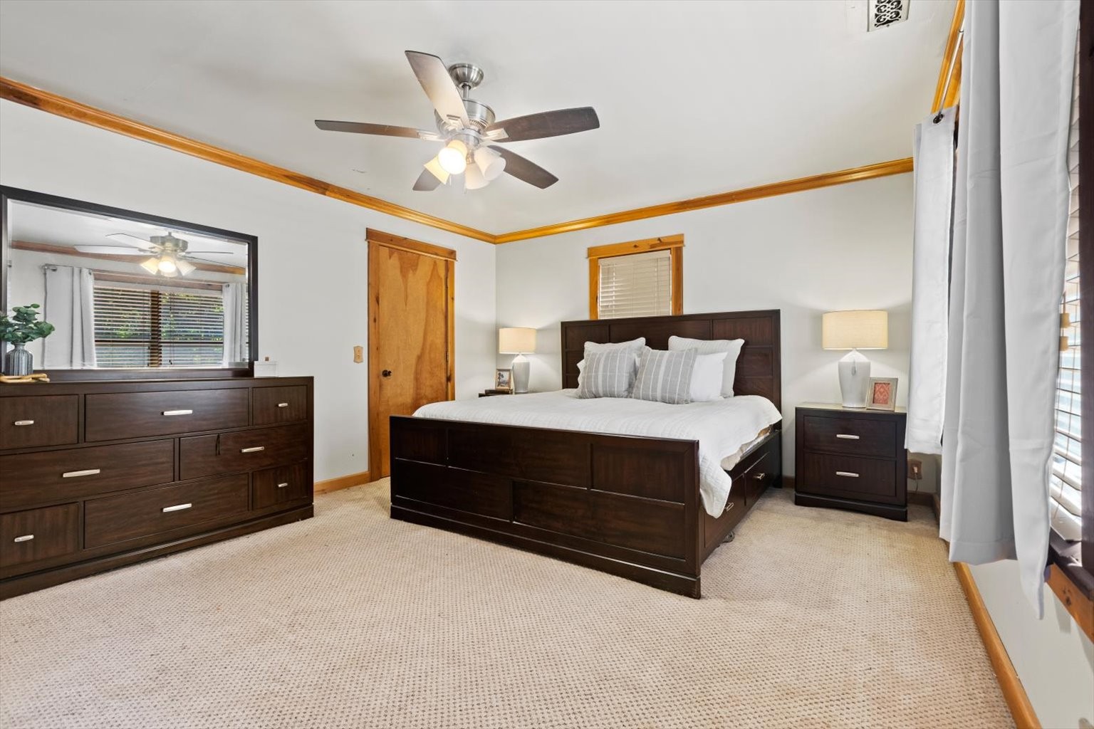 3911 Mobley's Cut Road Columbia, TN 38401 - Photo 10 of 19 a bedroom with a bed and a chandelier