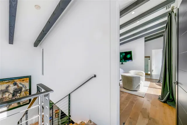 a kitchen with a sink cabinets and appliances