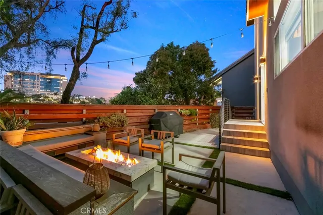 a kitchen with a table chairs and a dining table