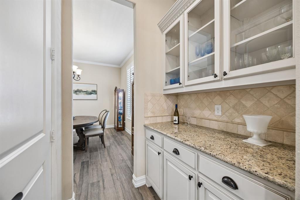 948 Holt Lane Allen, TX 75013 - Photo 7 of 40 Butler's pantry gives you extra cabinet and countertop space