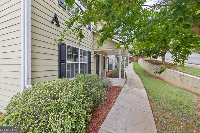 a view of a street with a house