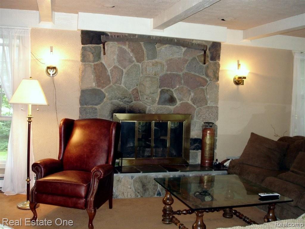 2250 East Gunn Road Rochester, MI 48306 - Photo 14 of 16 family room fireplace