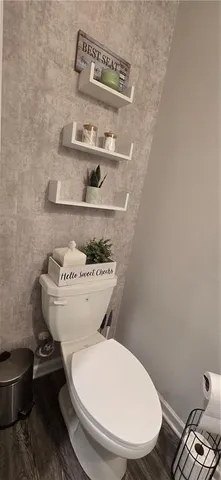 a bathroom with a sink a mirror and vanity