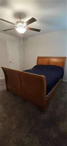 a view of wooden floor and closet in a room