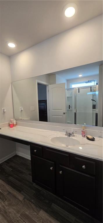 4757 Rdg Vly Drive Gainesville, GA 30504 - Photo 25 of 35 a bathroom with a double vanity sink and a mirror